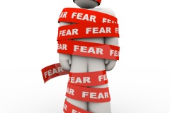 Scared Afraid Man Wrapped in Red Fear Tape